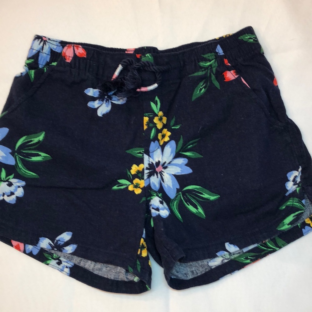 Girls navy blue with floral print linen shorts.
